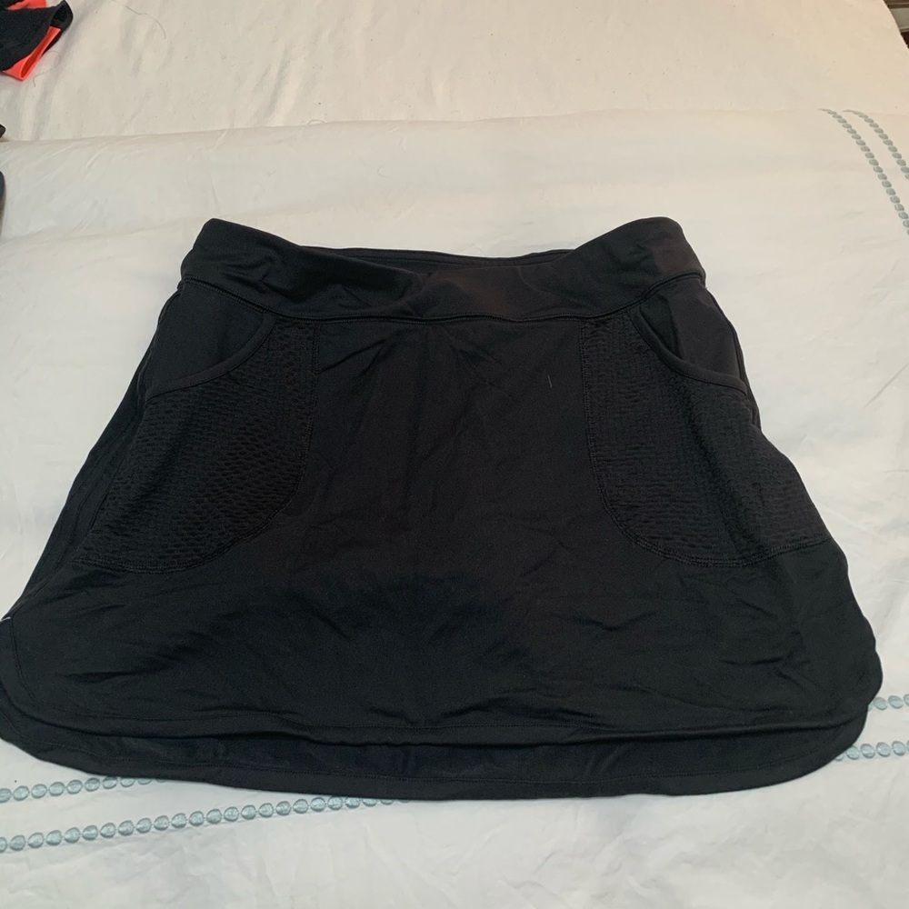 Carrie Underwood athletic wear tennis skirt.